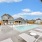 Chapel Creek Cottages resort-style swimming pool surrounded by lounge chairs