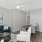 Open-concept living and dining room inside a unit at Chapel Creek Cottages