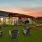 Chapel Creek Cottages community greenspace with Adirondack chairs